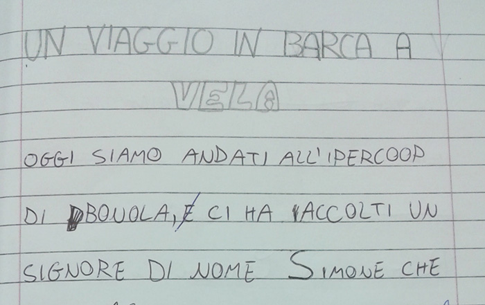 Parte di pagina scritta da un bambino: un viaggio in barca a vela